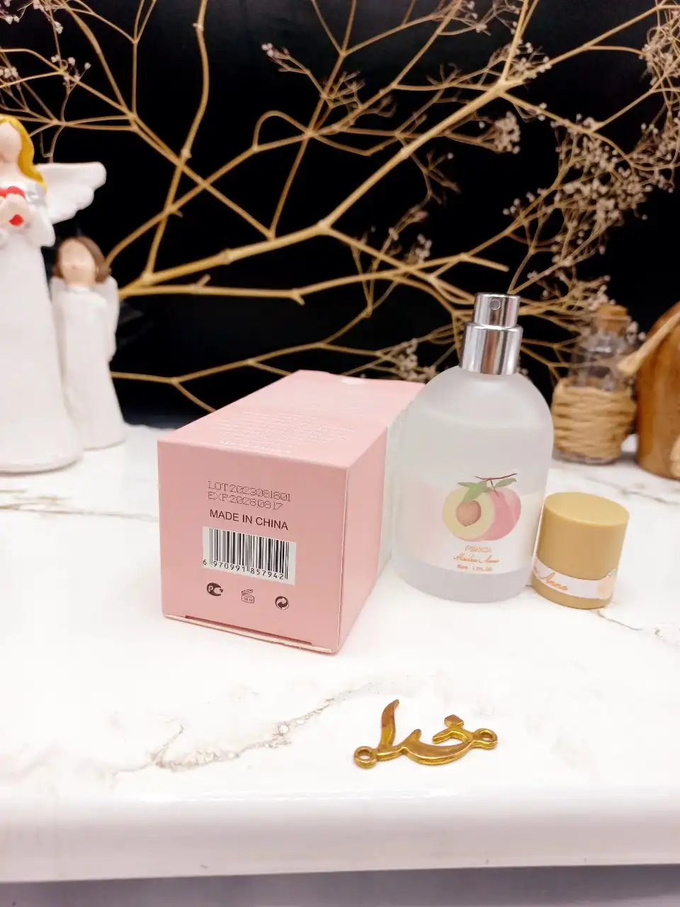 عطر خوش بو کننده بیکینی راحیه هلو برند Maiden Arna کد YT_E0259_6