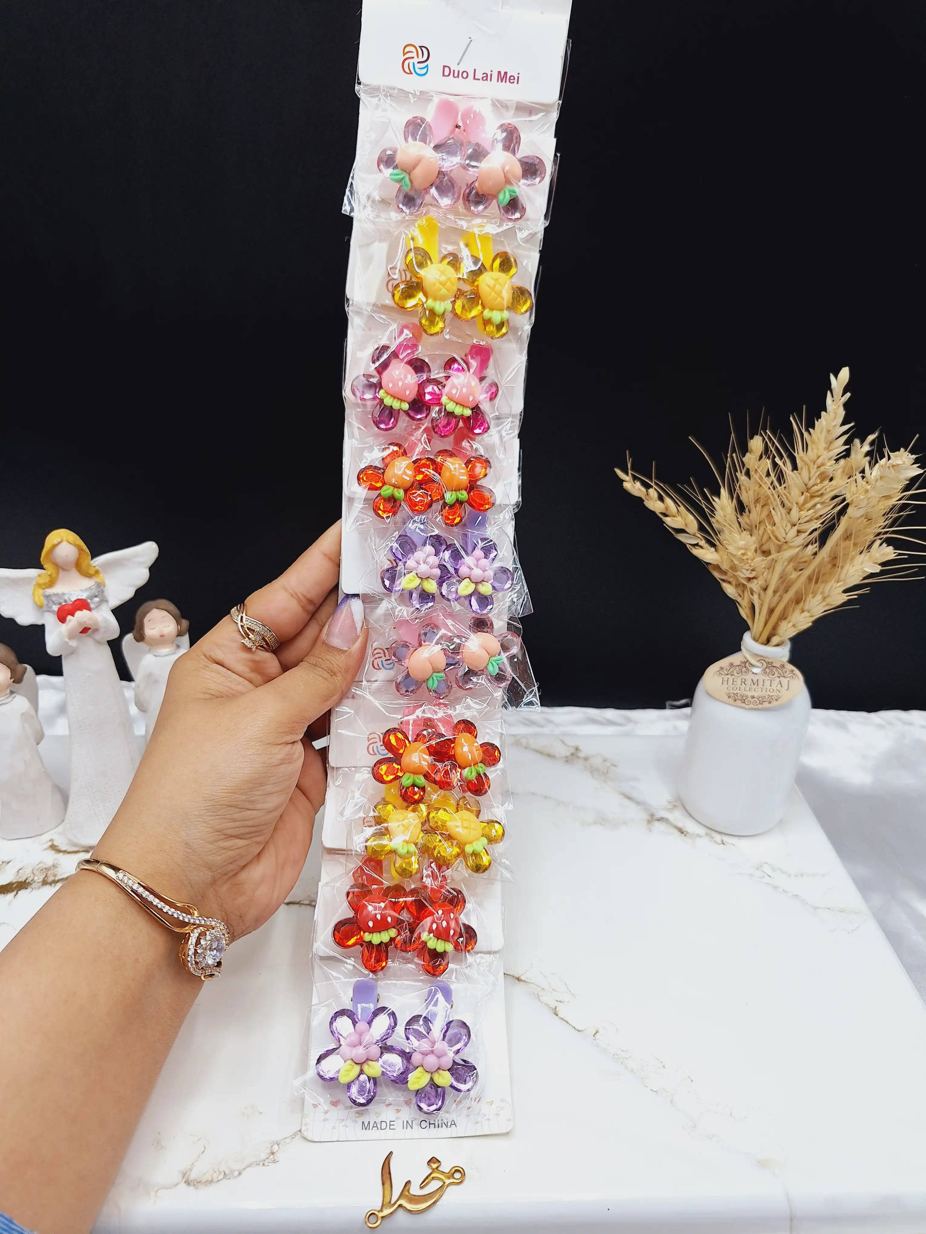 پک 10 عددی پنس مو طرح گل میوه ای طرح دوم