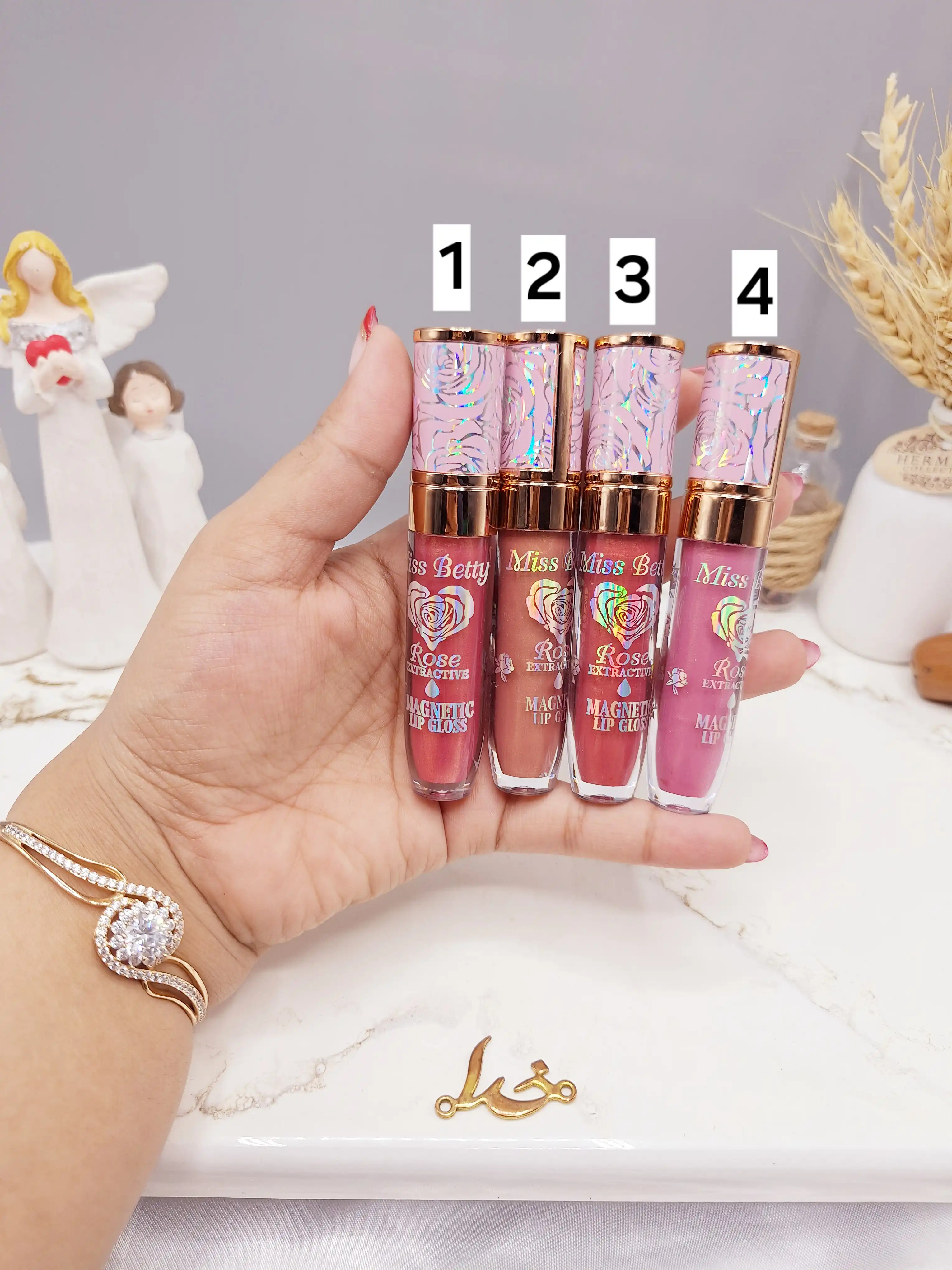لیپ گلاس شاین دار طرح گل برند میس بتی Miss Betty کد L3305