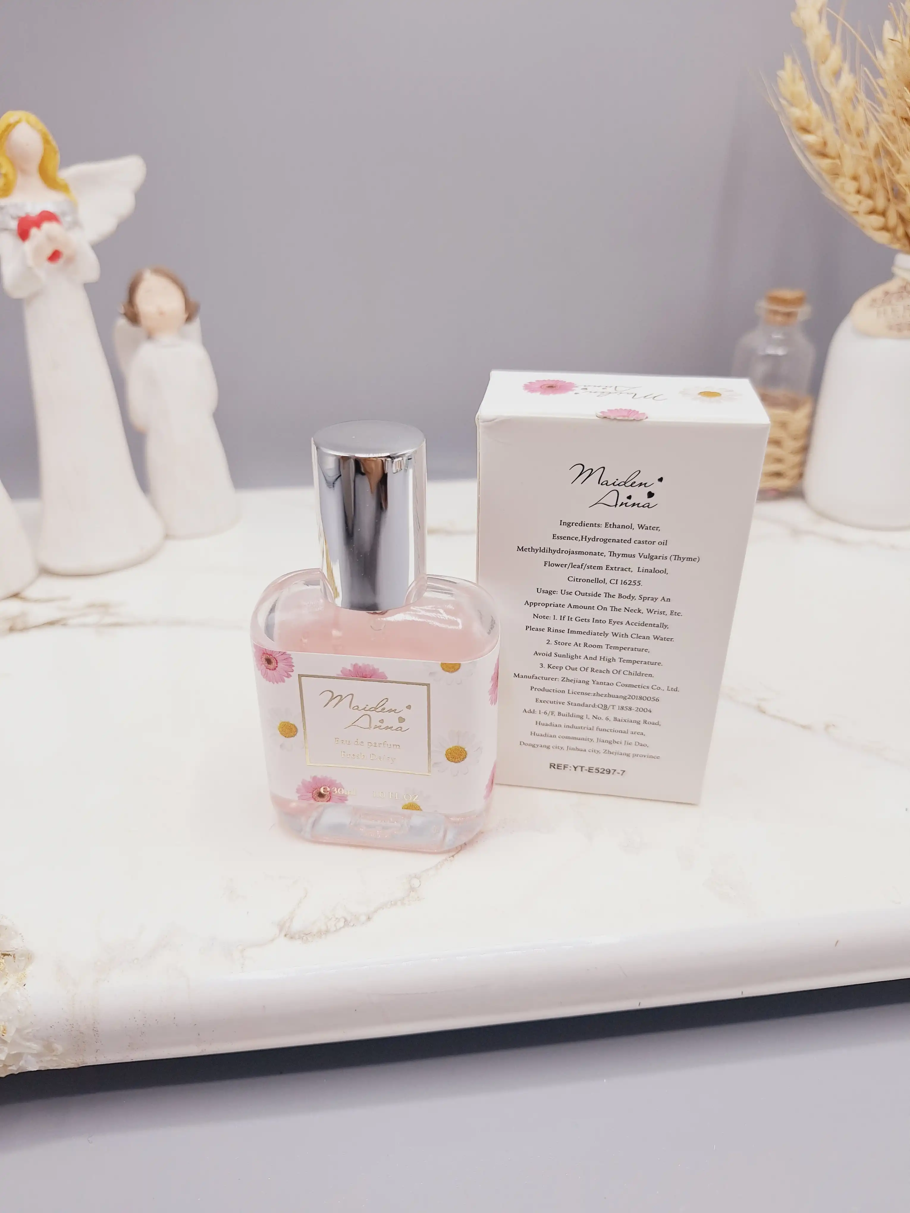 عطر مینی فانتزی دخترانه 30میل مدل گلهای داوودی ساخت چین کد YT-5297-7